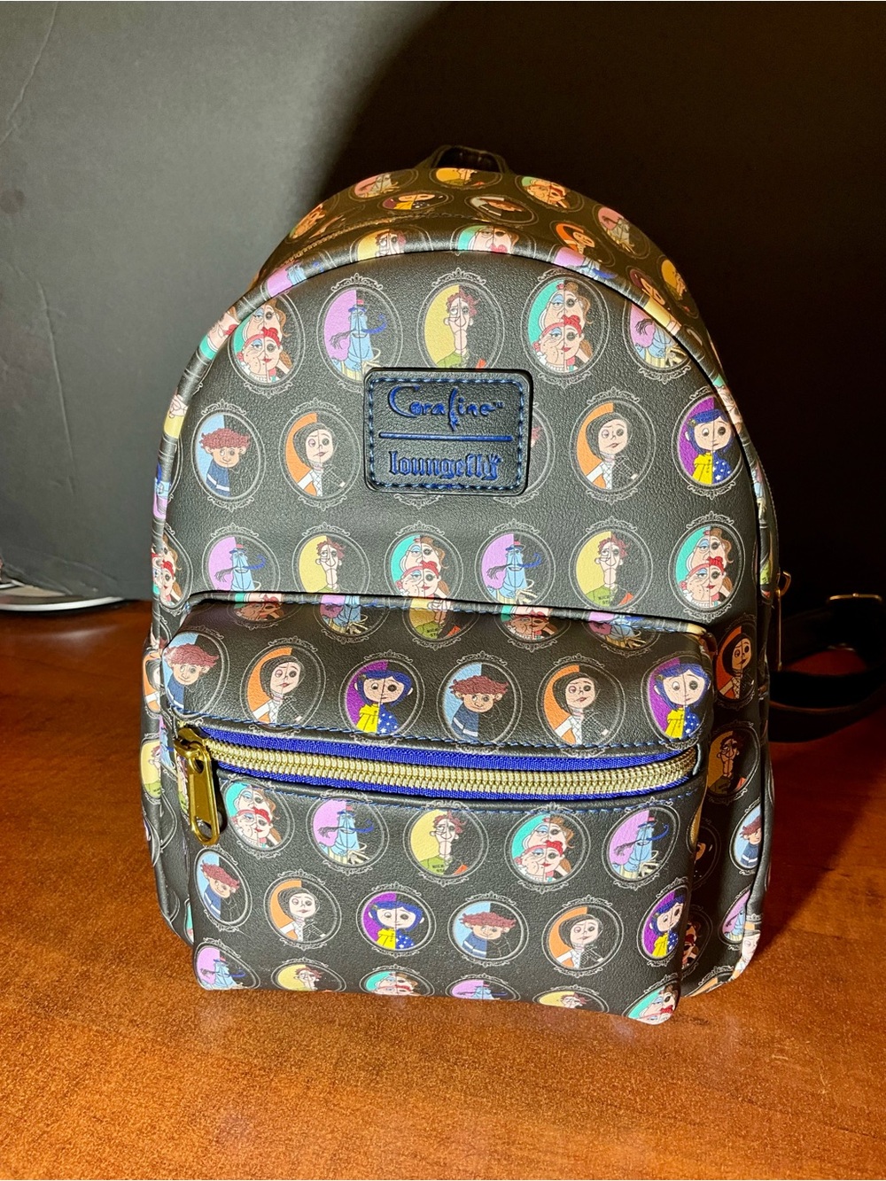 Loungefly Black Mini Backpack with Multicolor Character Circles